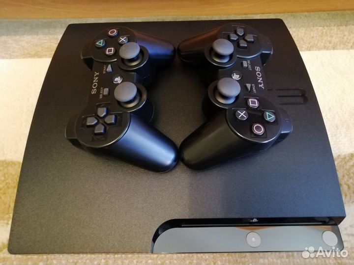 PlayStation 3 Slim 250Gb Прошитая 2 джоя и 65 игр