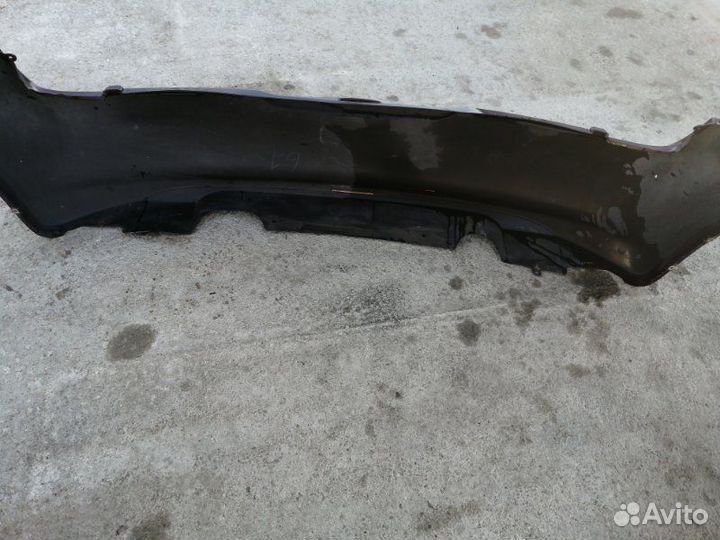 Бампер задний Nissan March K12