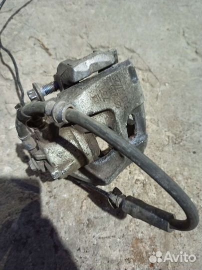 Суппорт передний левый Опель Вектра C