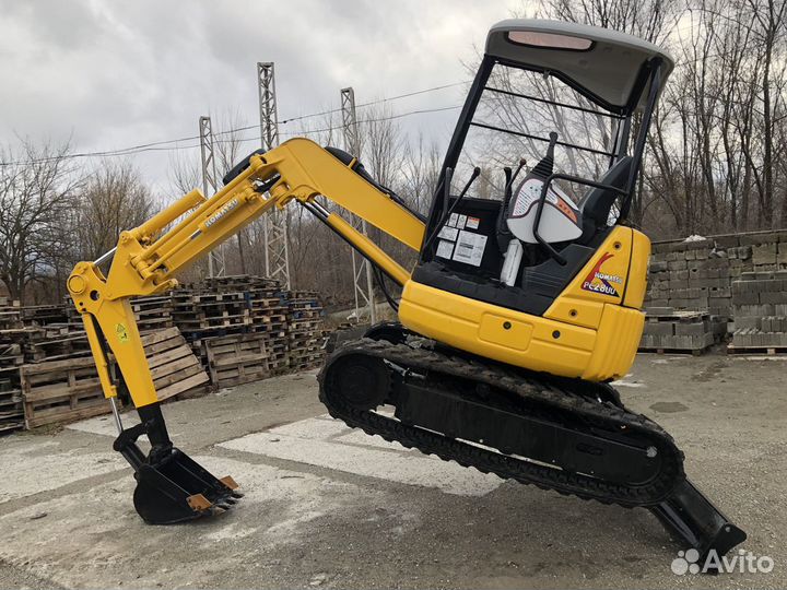 Рытье ям траншей мини экскаватором