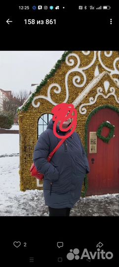 Пуховик женский бу разм.64 в хорошем состоянии