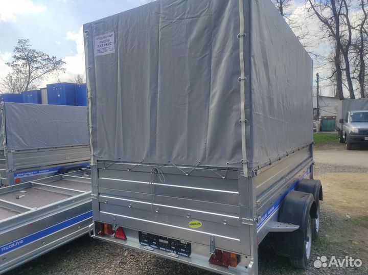 Двухосный прицеп с бортами и тентом