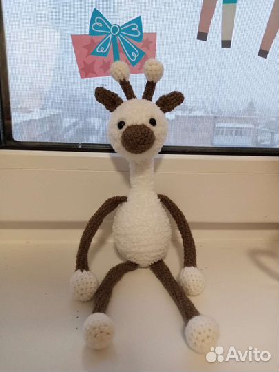 Игрушка лягушка