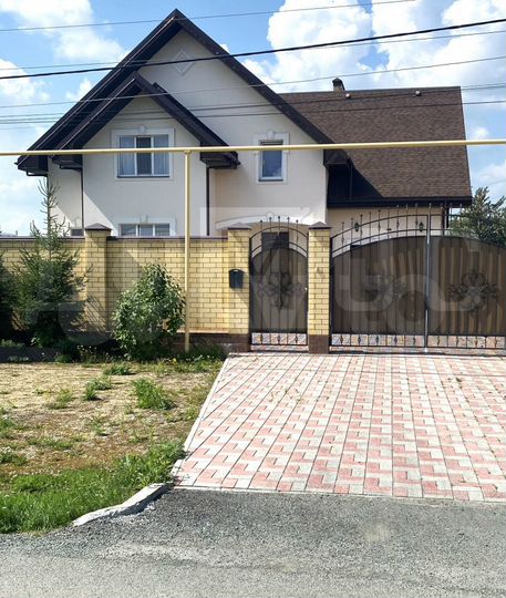 Коттедж 307 м² на участке 12 сот.