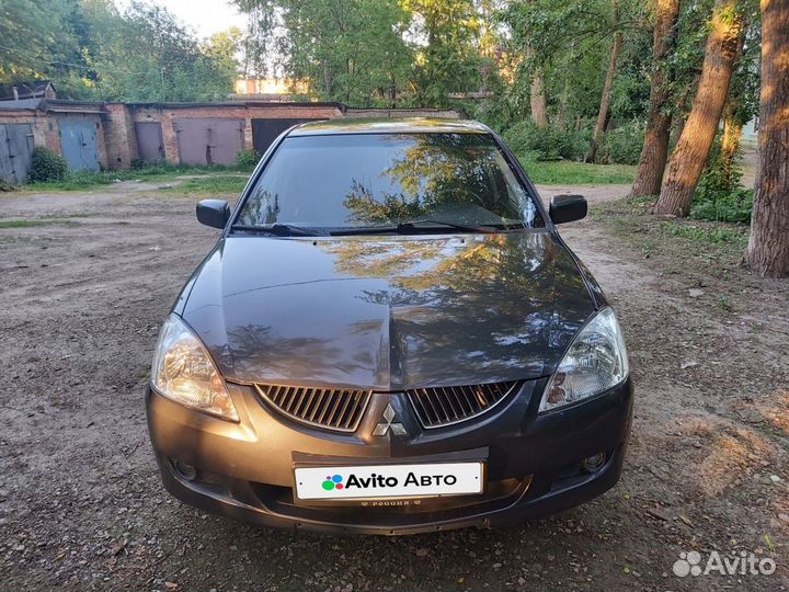 Mitsubishi Lancer 1.6 AT, 2004, 220 300 км