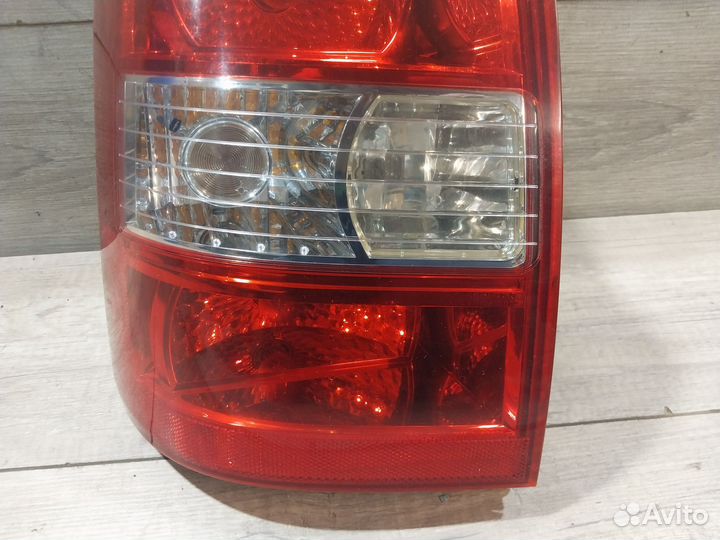 Фонарь левый Hyundai Tucson 1 JM 92401-2E0