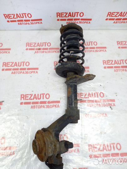 Амортизатор передний левый Daewoo Nexia