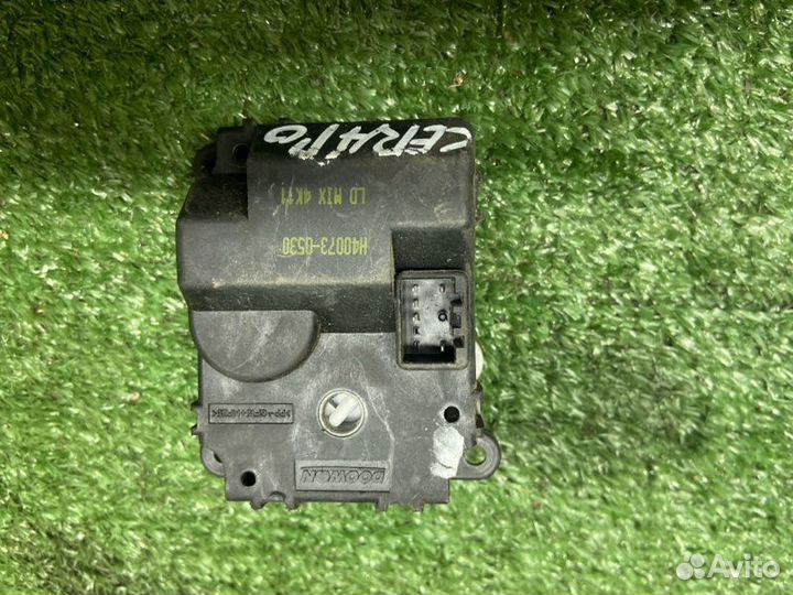 Моторчик заслонки печки Kia Cerato 1