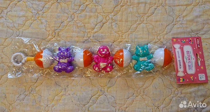 Погремушка на коляску кроватку