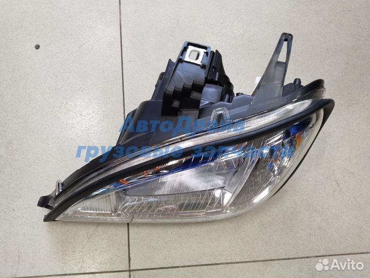 Фара головного света Freightliner Columbia левая