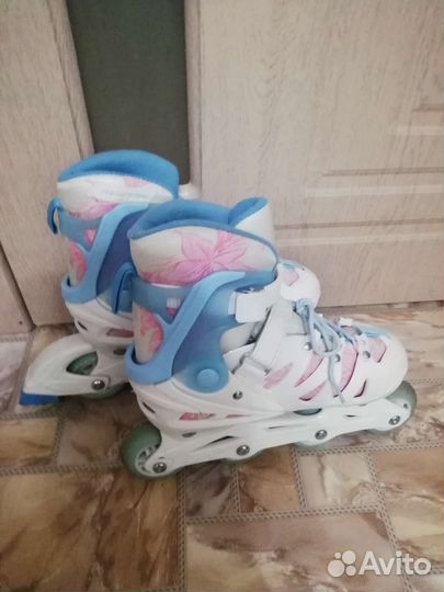 Роликовые коньки