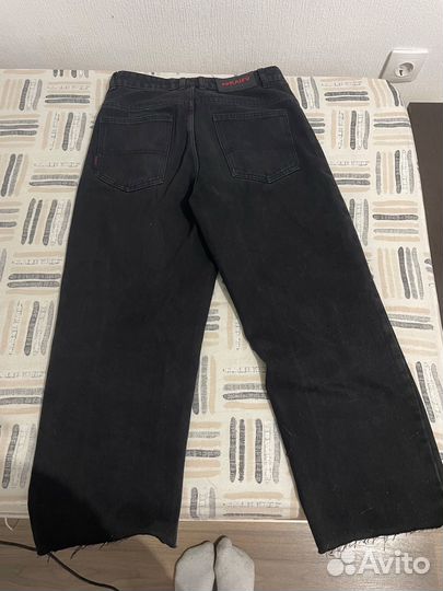 Джинсы широкие