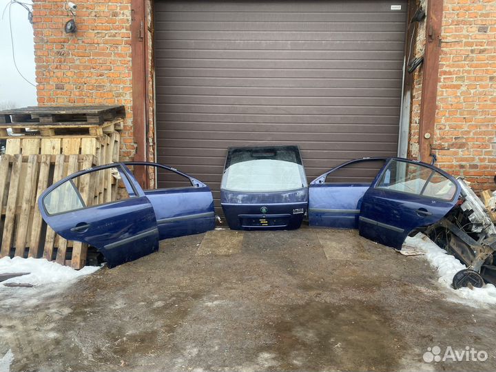 Skoda octavia тур A4 1U дверь