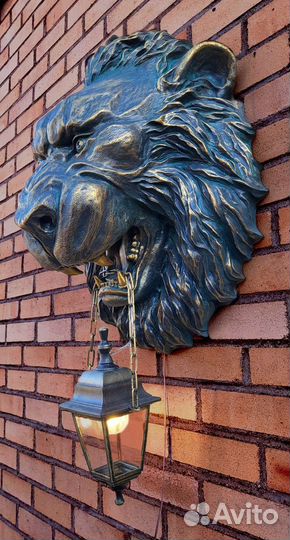 Барельеф голова льва