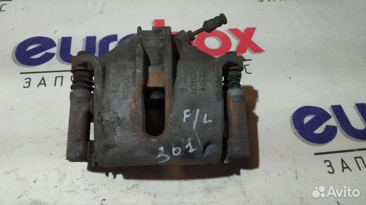 Суппорт передний левый Peugeot 301 2013-2016