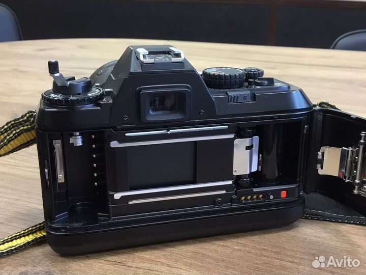 Nikon F-501+Sigma AF zoom 1:3,8 f75-200mm