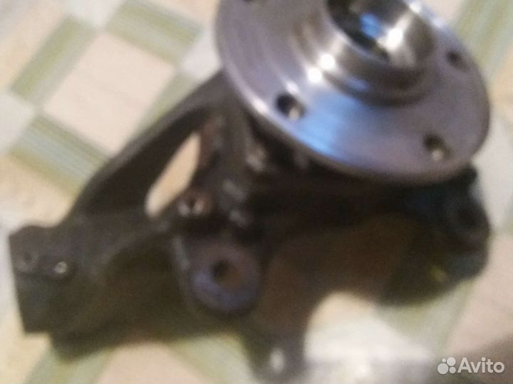 Повотный кулак на октавию а7 (левый)