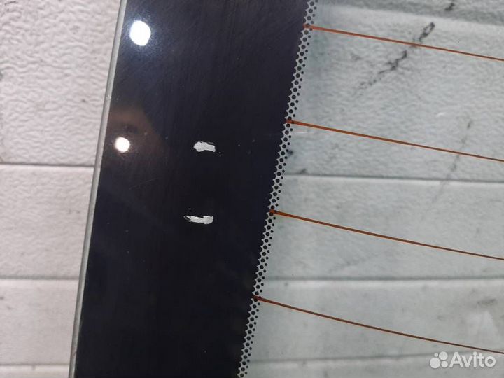 Стекло заднее Nissan Tiida 2008