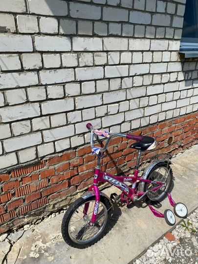 Детский велосипед Stels с двумя доп. колесами