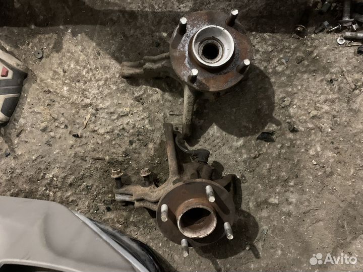 Кулак поворотный Nissan Almera wingroad sunny и др