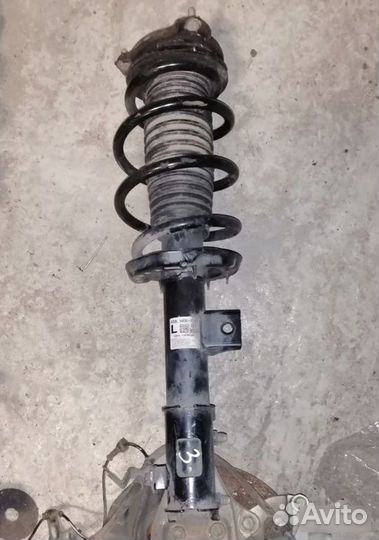 Амортизатор передний левый Kia Sportage 5 NQ5 G4NL