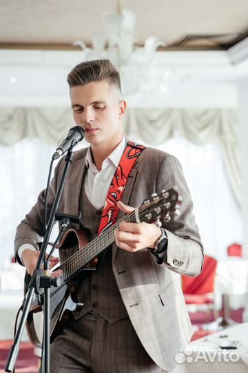 Поющий гитарист