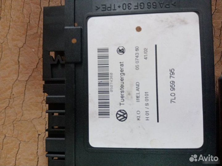 Моторчик стеклоподъемника задний Volkswagen