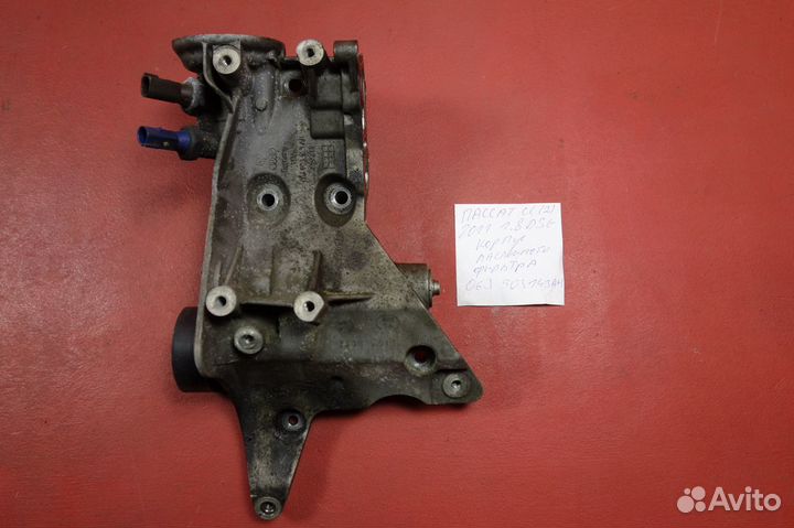 Кронштейн генератора масленого фильтра пассат сс