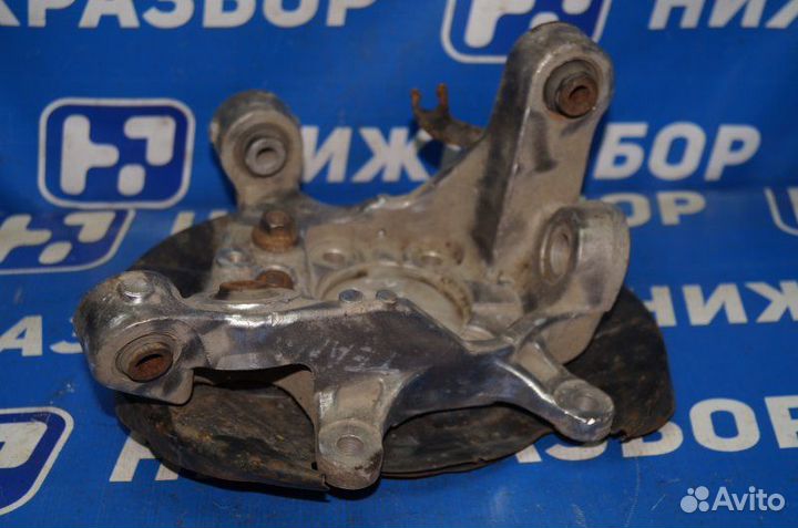 Кулак поворотный задний левый Nissan Teana J32