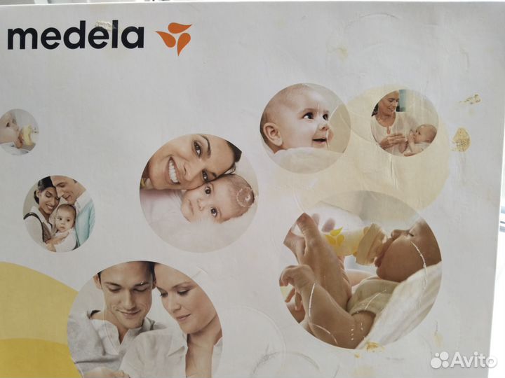 Молокоотсос medela электрический