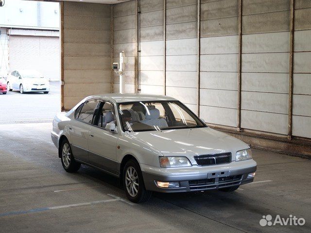 Планка замка капота Toyota Camry SV40