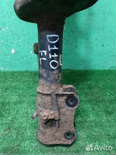 Стойка амортизатора передняя левая Suzuki Grand V