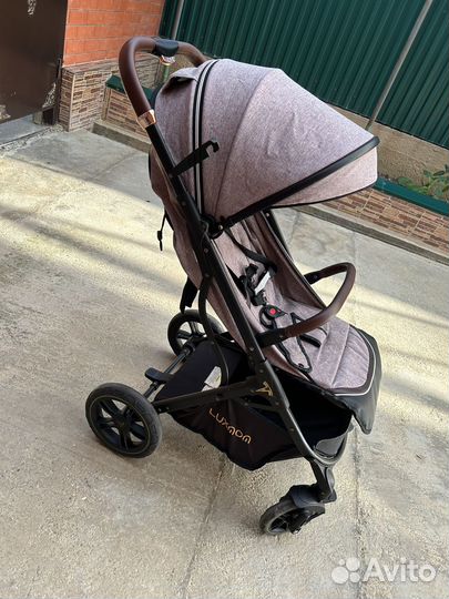 Прогулочная коляска luxmom 609