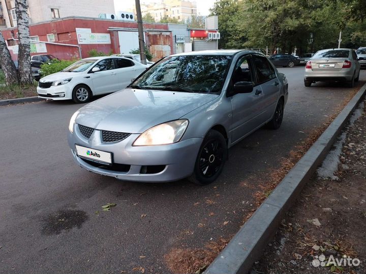 Mitsubishi Lancer 1.3 МТ, 2004, битый, 231 000 км