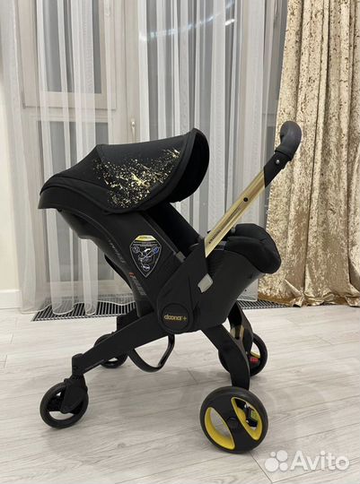 Коляска автокресло Doona gold limited edition