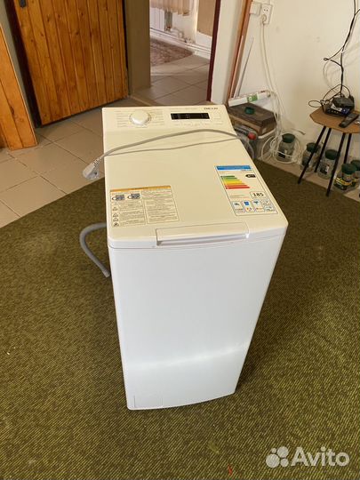 Стиральная машина с вертикальной загрузкой