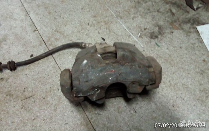 Вольво S40 суппорт тормозной передний 36000484