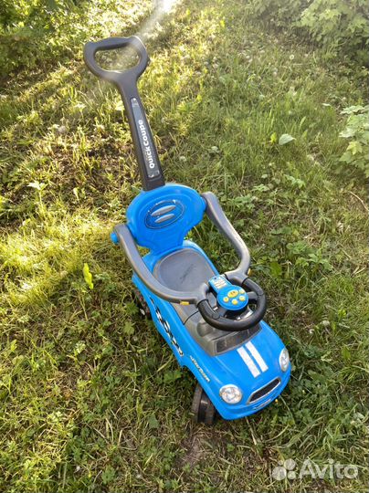 Игрушка каталка с ручкой