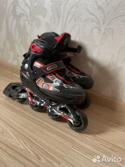 Роликовые коньки