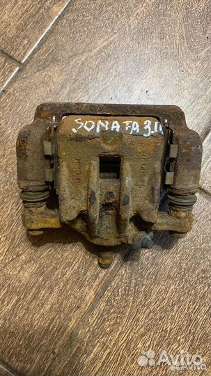 Суппорт задний правый Sonata EF Tagaz