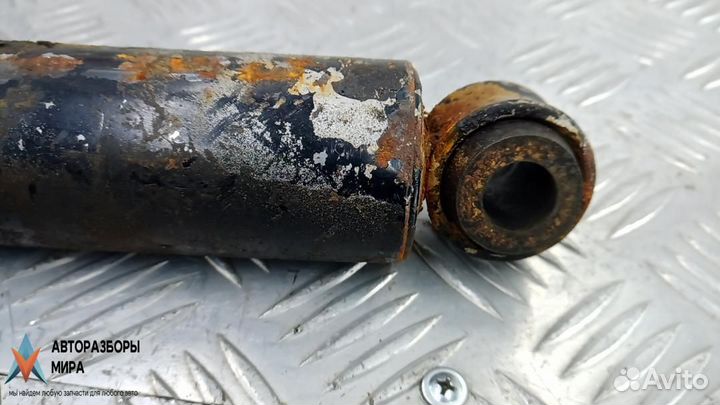 Амортизатор задний Mitsubishi L200 3 рест. 2004