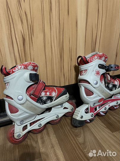 Роликовые коньки