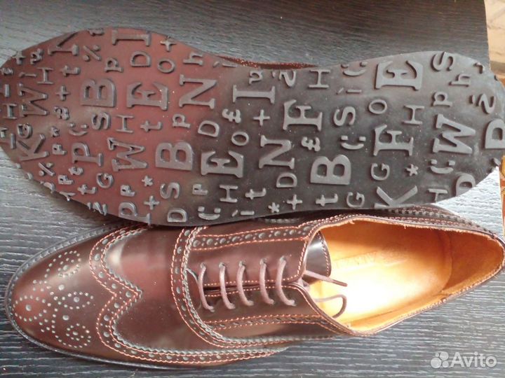 Новые кожаные ботинки