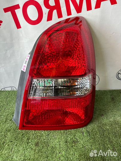 Фонарь правый Nissan Primera HP12