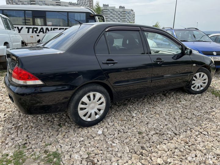 Mitsubishi Lancer 1.6 МТ, 2009, 149 000 км