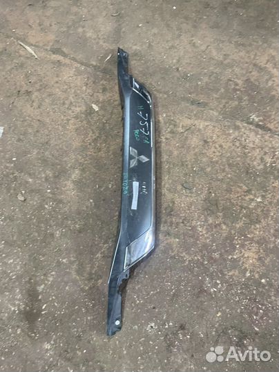 Накладка двери багажника задняя Mitsubishi