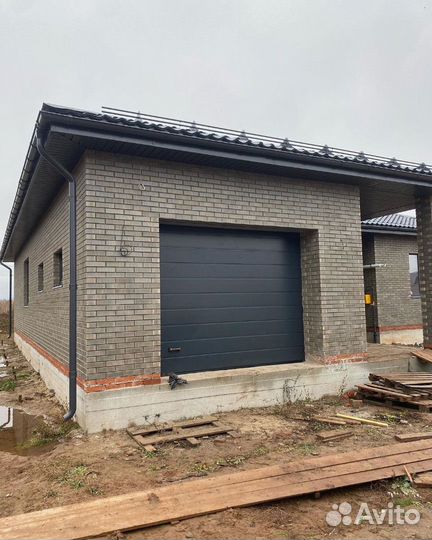 Секционные гаражные ворота