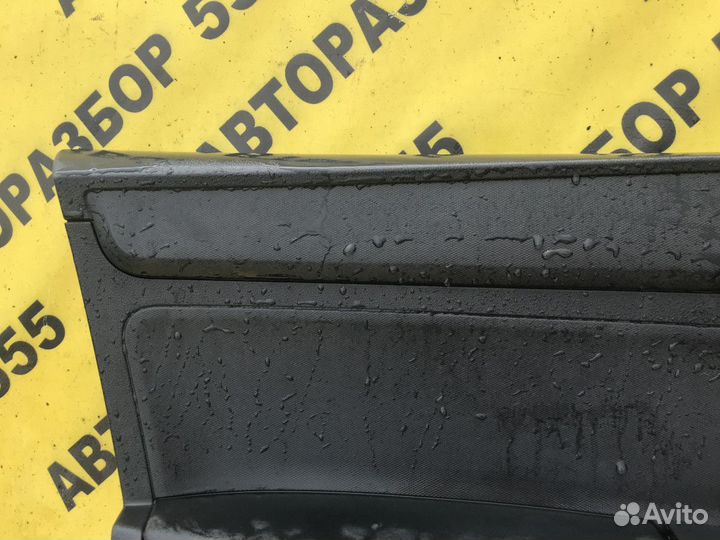 Обшивка двери передней левой Skoda Rapid