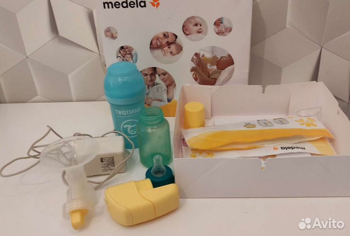 Молокоотсос medela электрический