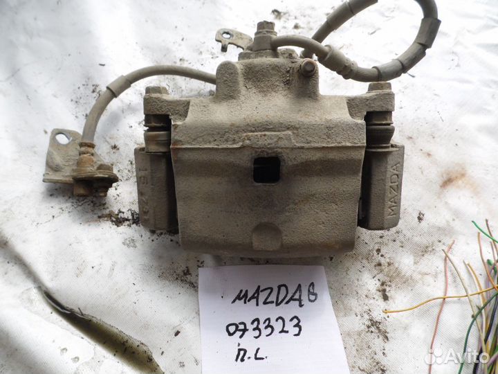 Суппорт тормозной передний левый Mazda Mazda 6 (GH